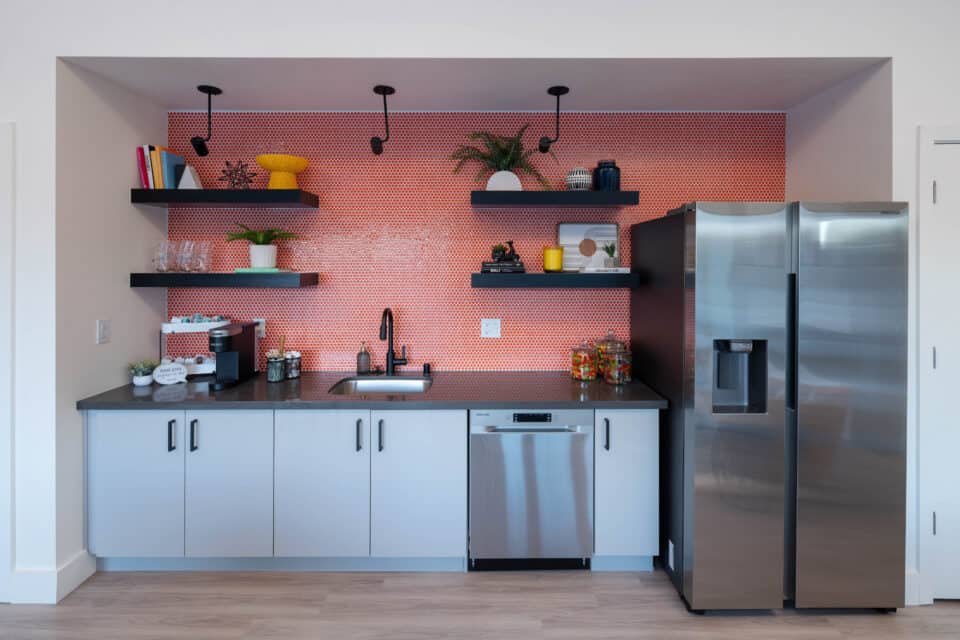 Upgraded Community Kitchen with Red Backsplash